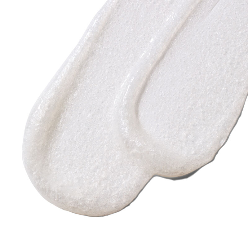Swatch of the limited-edition MKMen Invigorating Face Scrub product, showing a close-up of the formula and texture